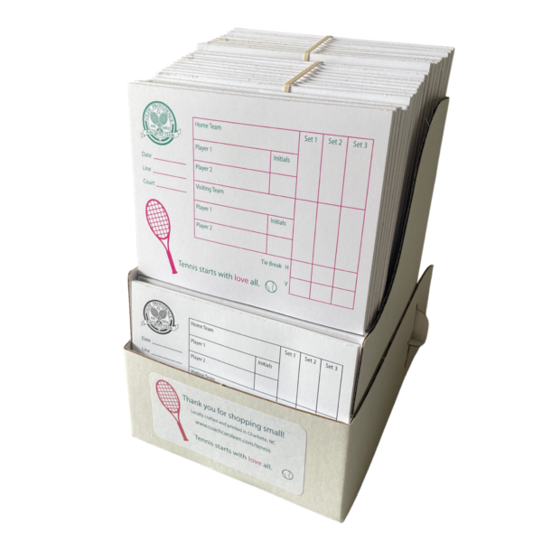 Caroleen's tennis score pads in a white cardboard box